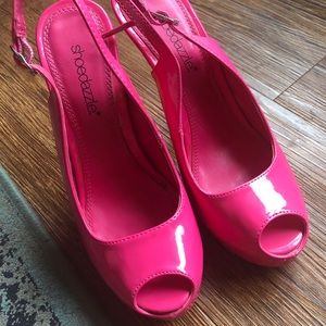 Pink patent leather peep toe stilettos